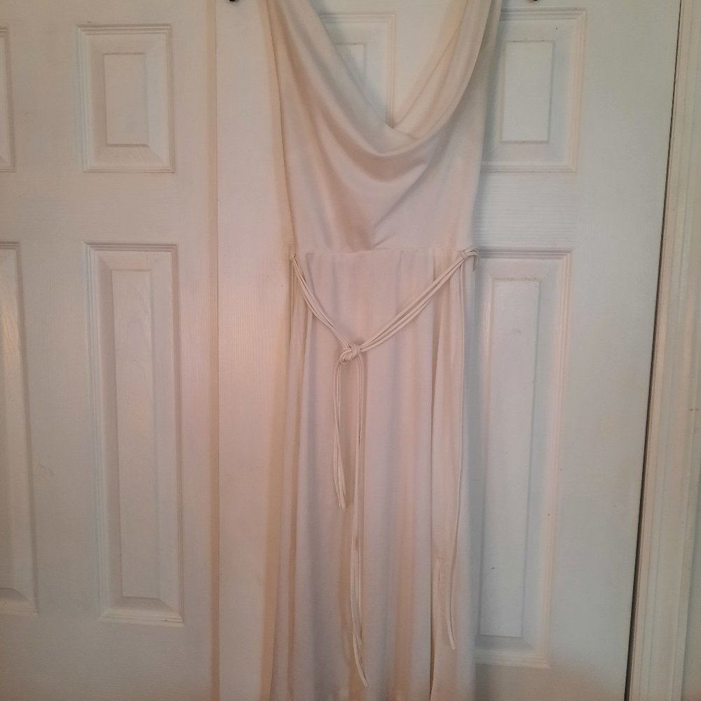 Women's long sleeveless white gown, strappy back